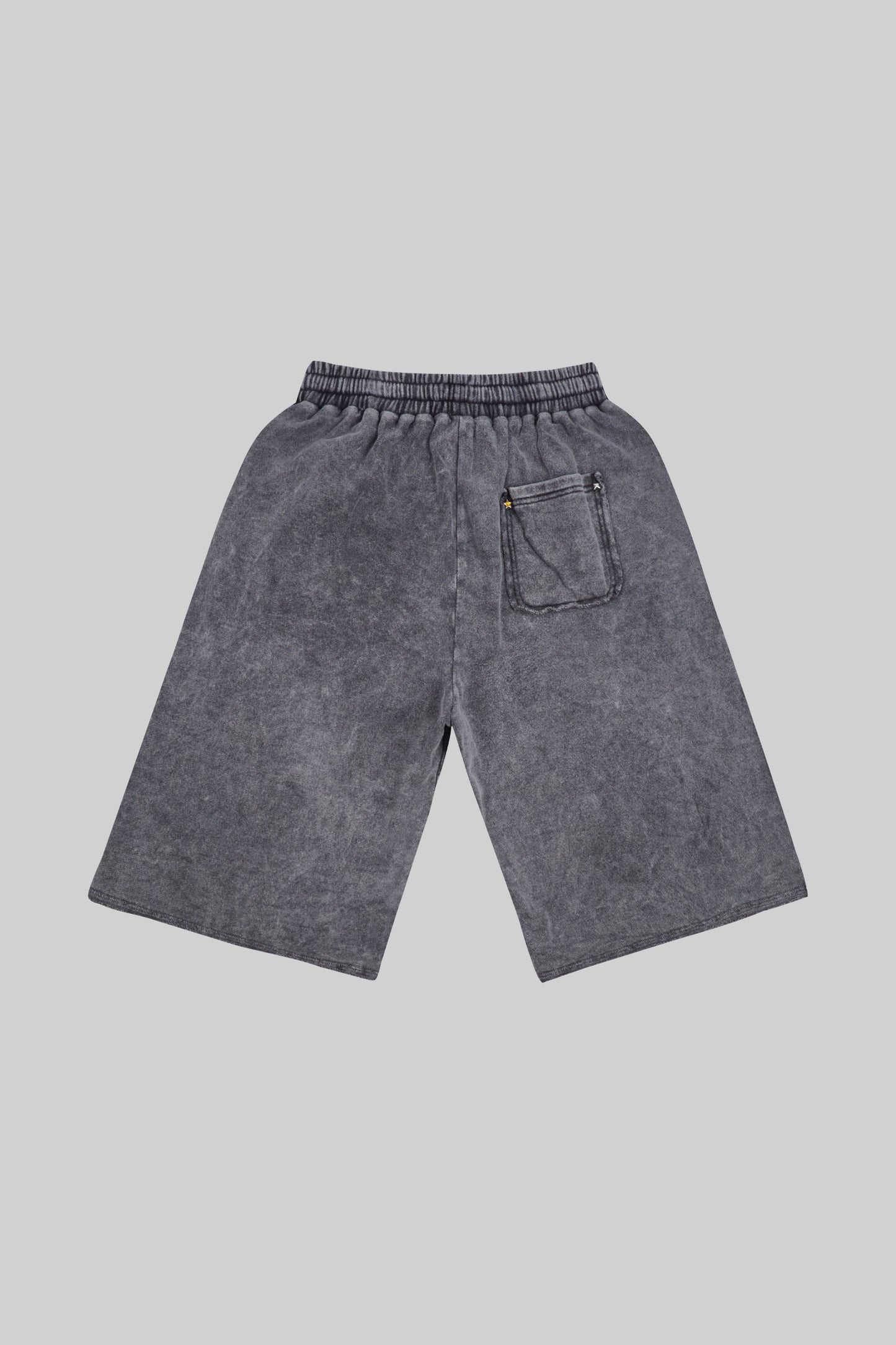 Black French terry long shorts from Bross Before Hos Boutique, showing the relaxed fit and soft fabric texture.
