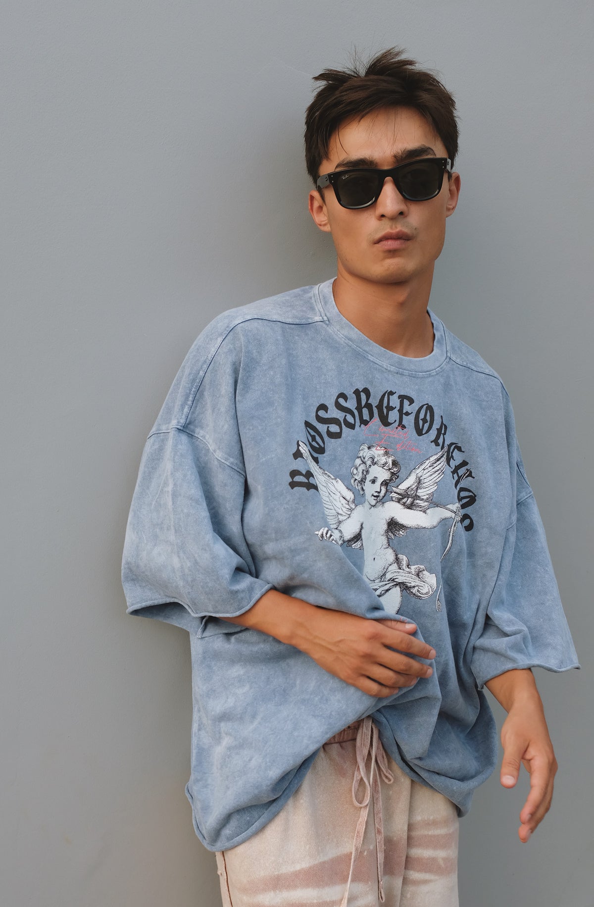 Black Bross Before Hos Boutique T-shirt with white angel print front, casual crew neck style, on a plain background.