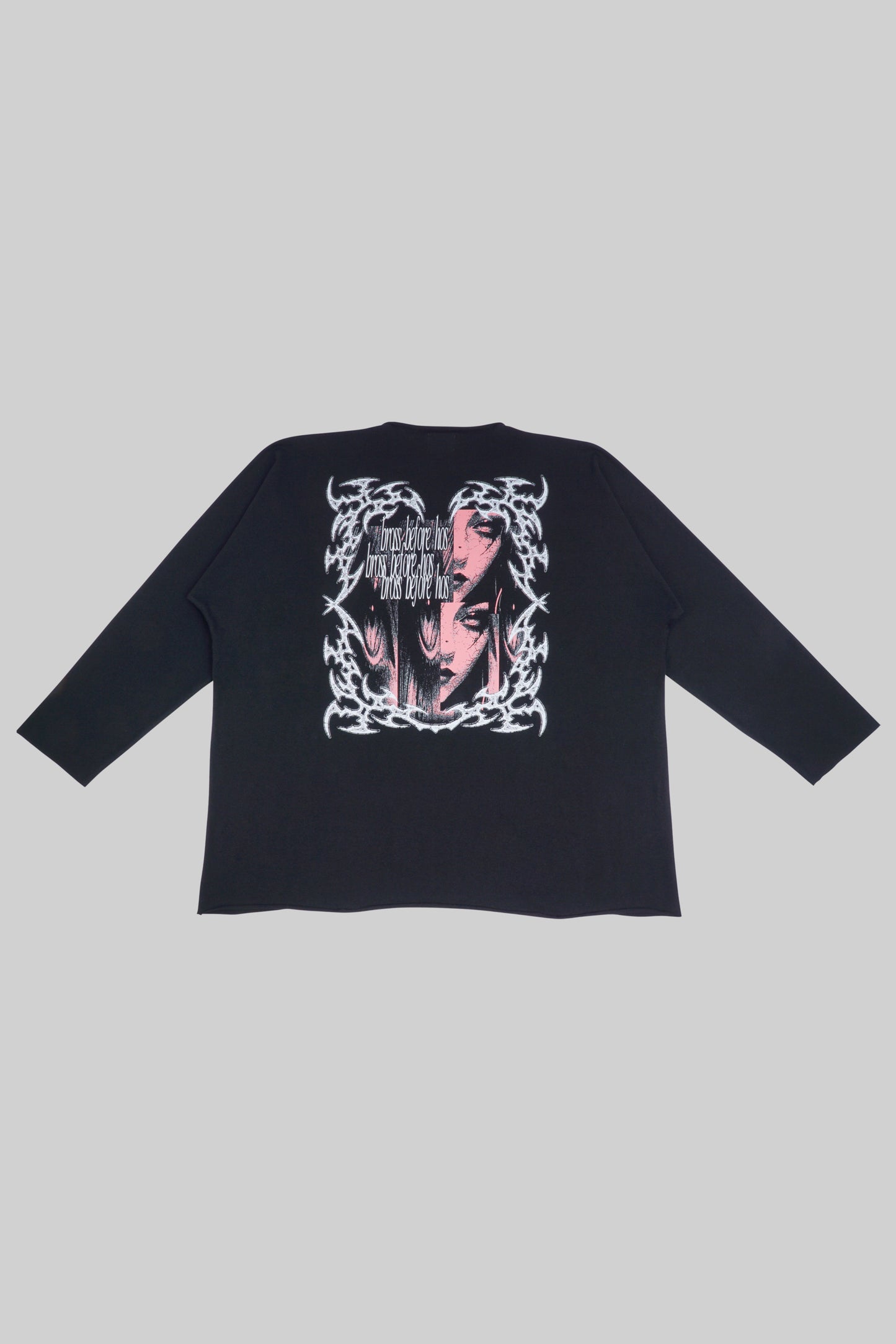 Black longsleeve T-shirt with a face print by Bross Before Hos Boutique, featuring graphic artwork on the front.