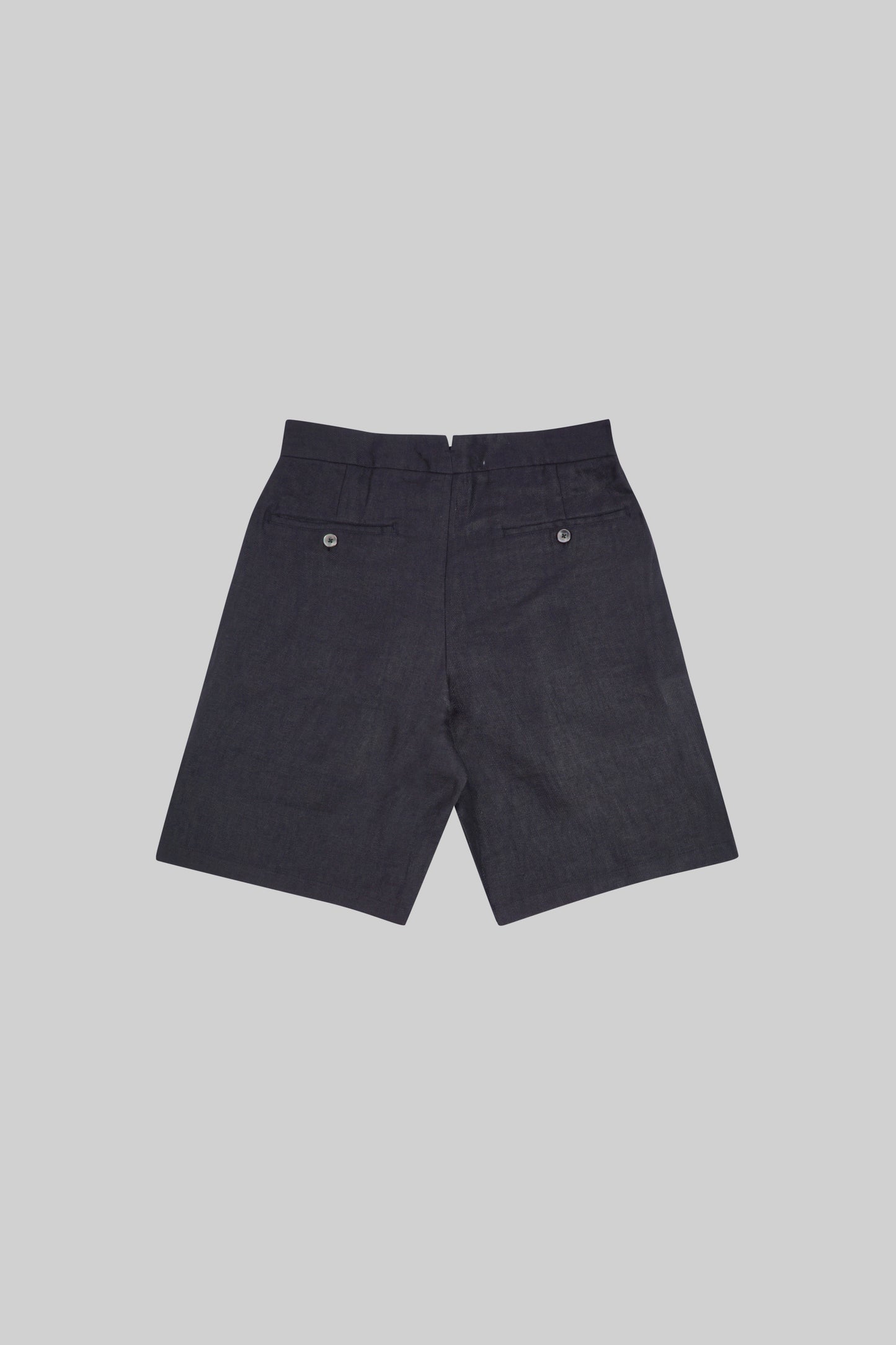Black linen shorts by Bross Before Hos Boutique, showcasing relaxed fit and lightweight fabric for warm weather.