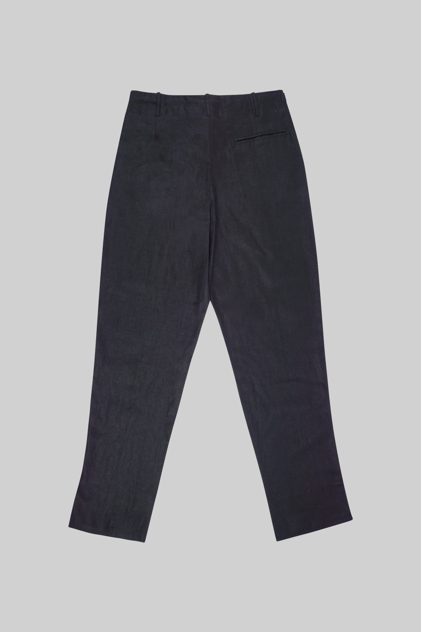 Light beige linen pants from Bross Before HOS Boutique, showcasing relaxed fit and soft fabric detail.