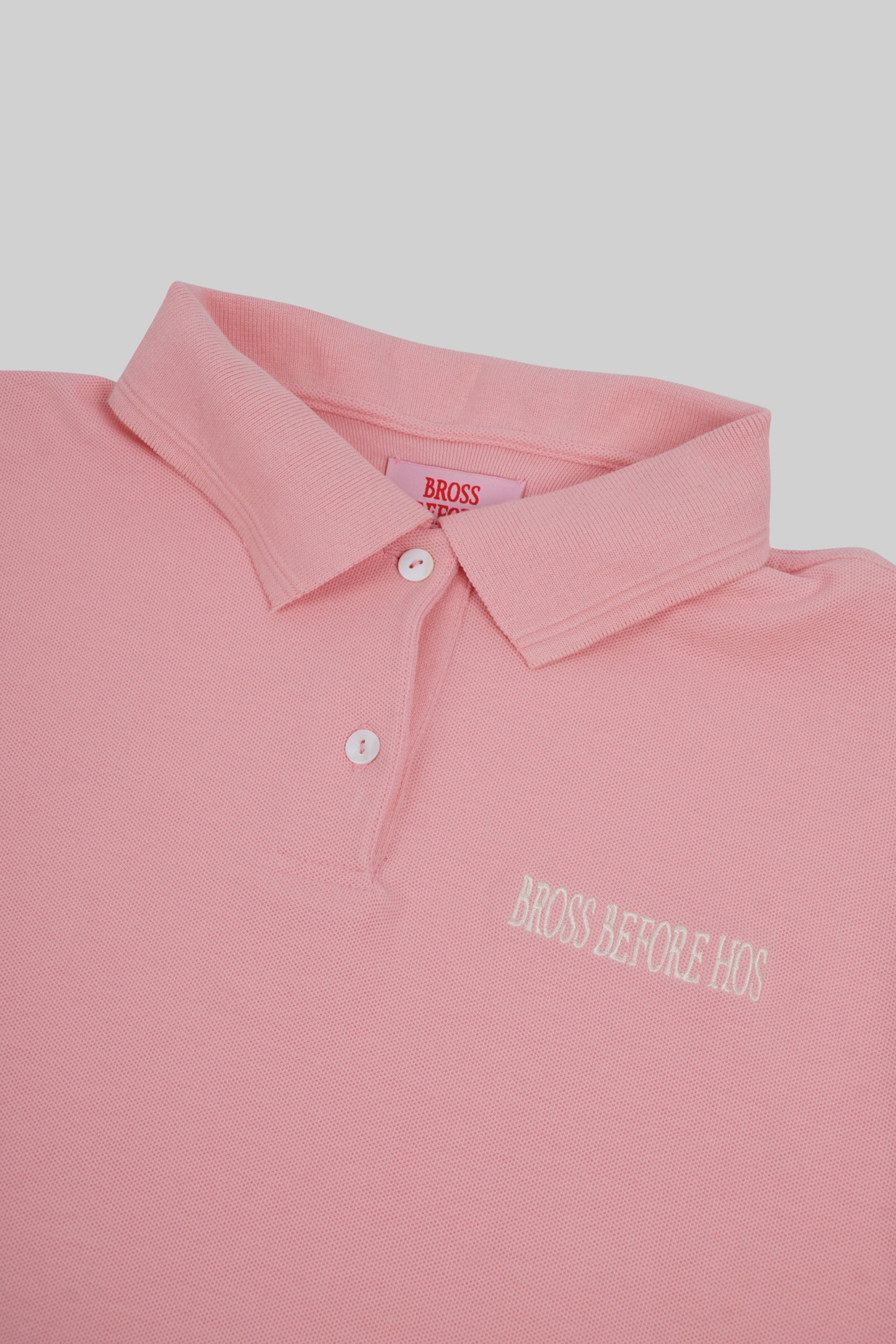 Woman's polo T-shirt by Bross Before Hos Boutique, featuring a classic fit and soft fabric in a casual style.