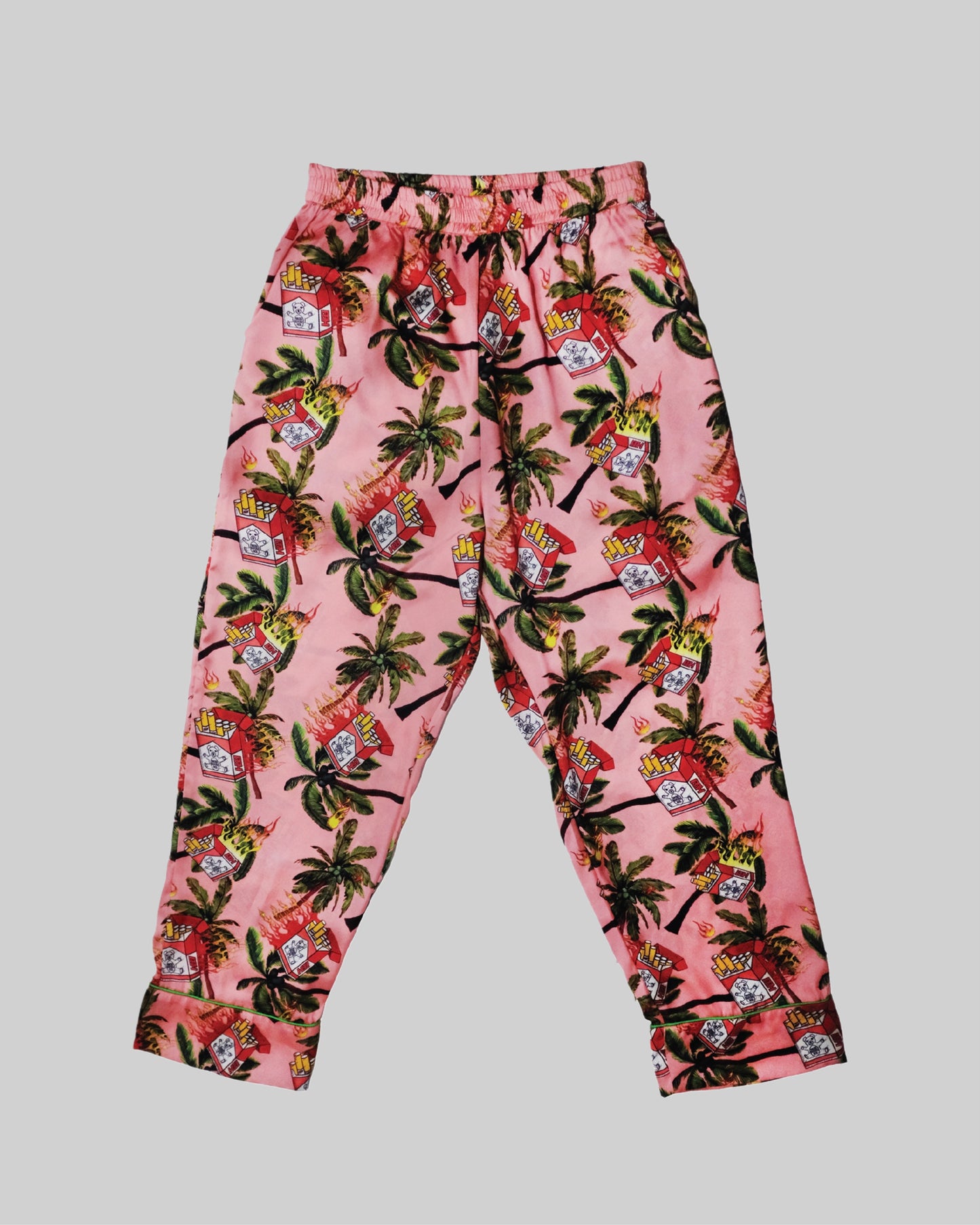 Silk pajama set from Bross Before H Os Boutique, featuring a soft, luxurious fabric with a relaxed fit and classic design.