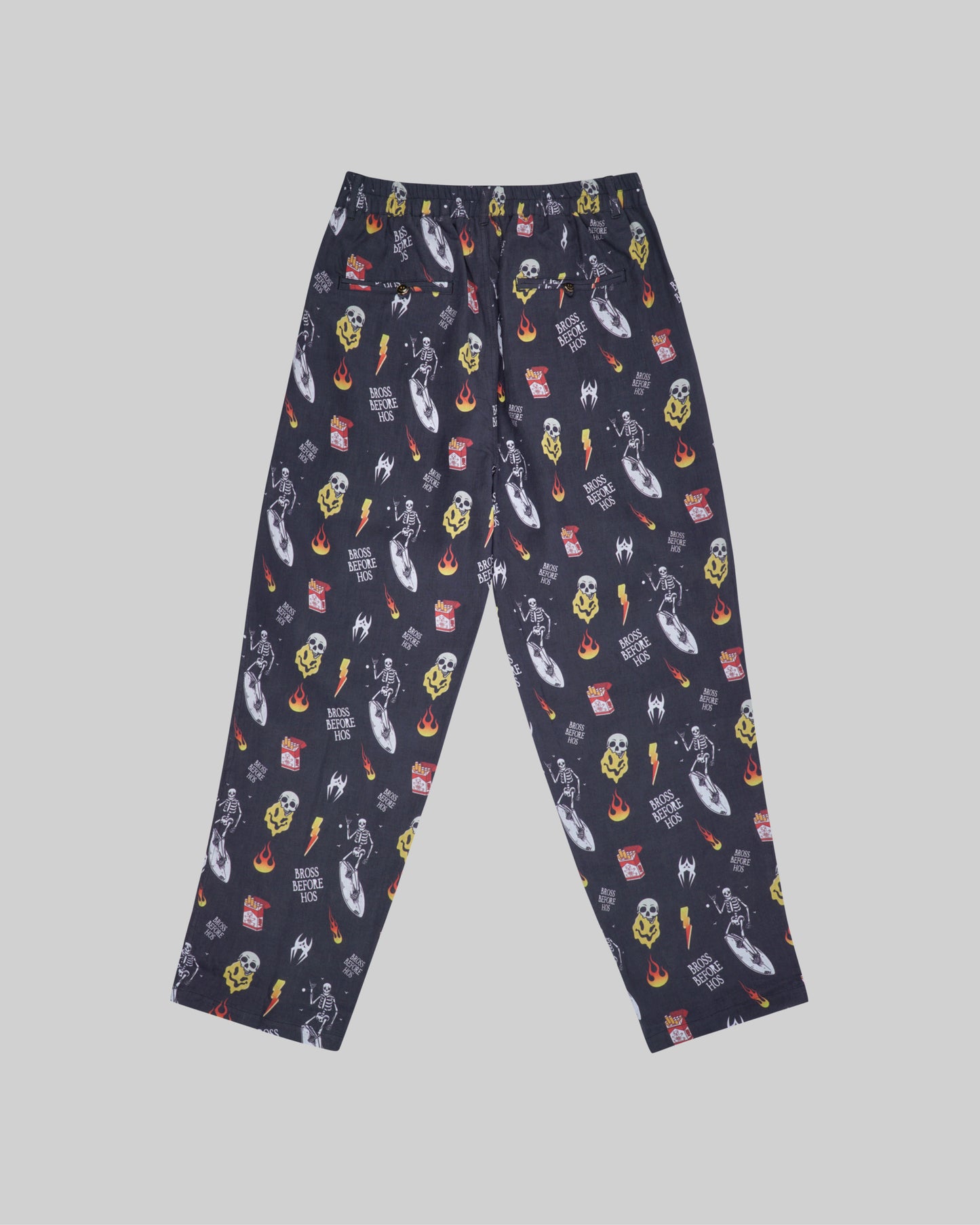 Black relaxed fit linen printed pants from Bross Before Hos Boutique, featuring casual, comfortable design and stylish pattern.