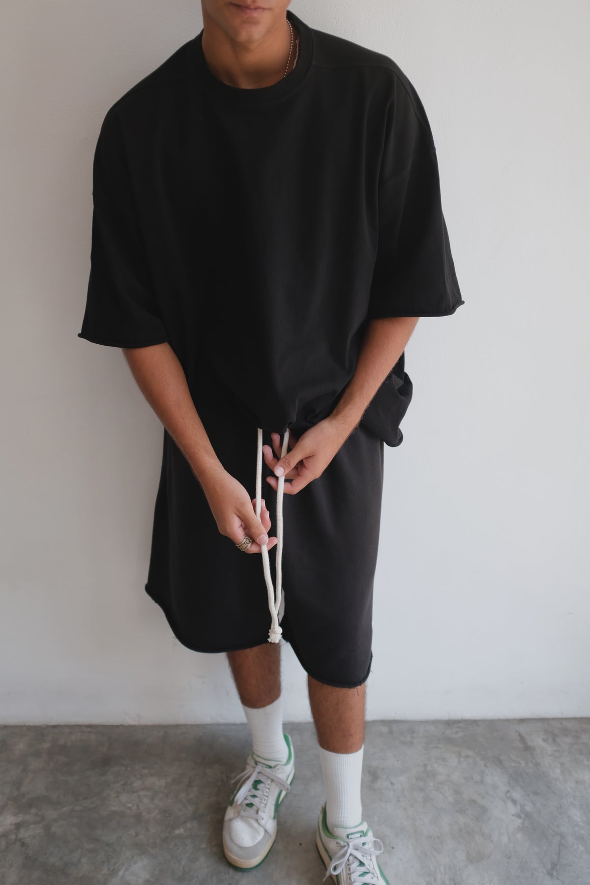 Black French Terry shorts by Bross Before Hos Boutique, shown lying flat with a comfortable, casual fit.