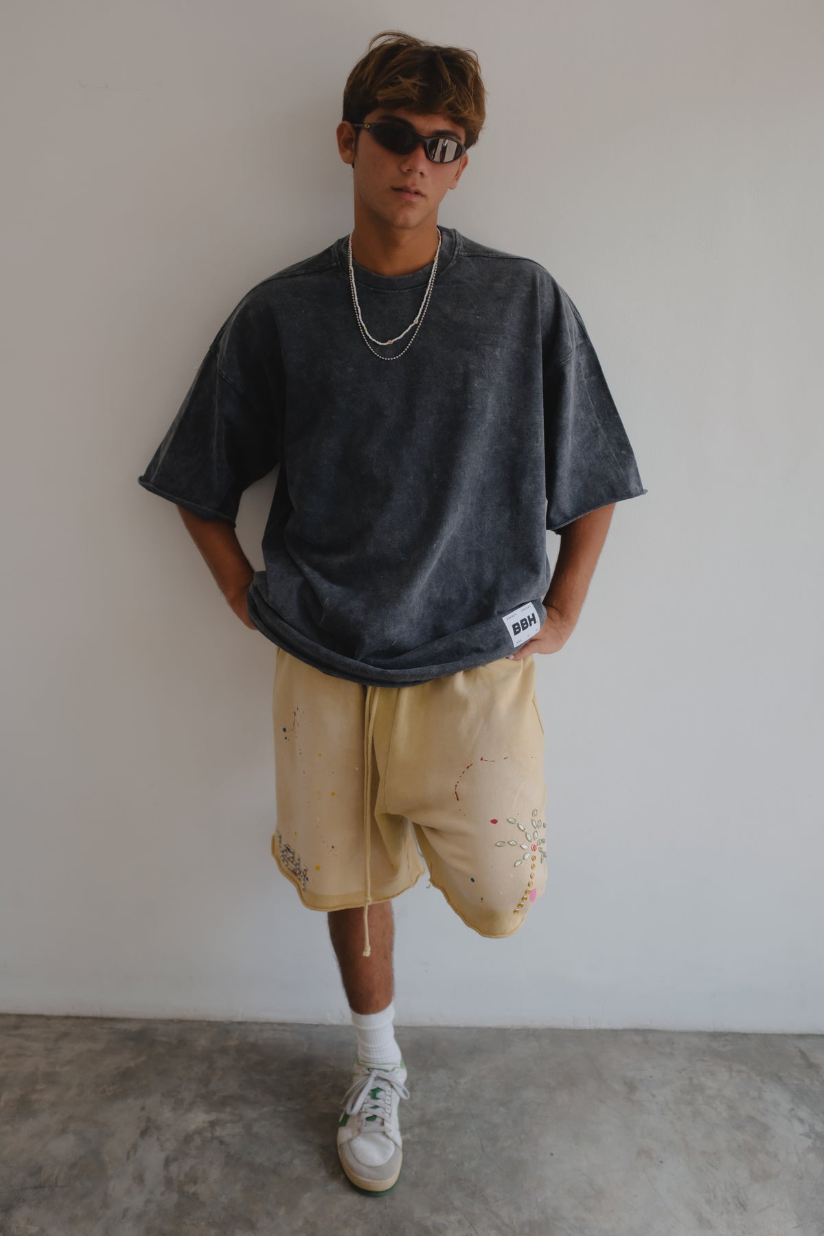 Black stonewashed T-shirt from Bross Before Hos Boutique featuring a casual fit and soft, distressed fabric.