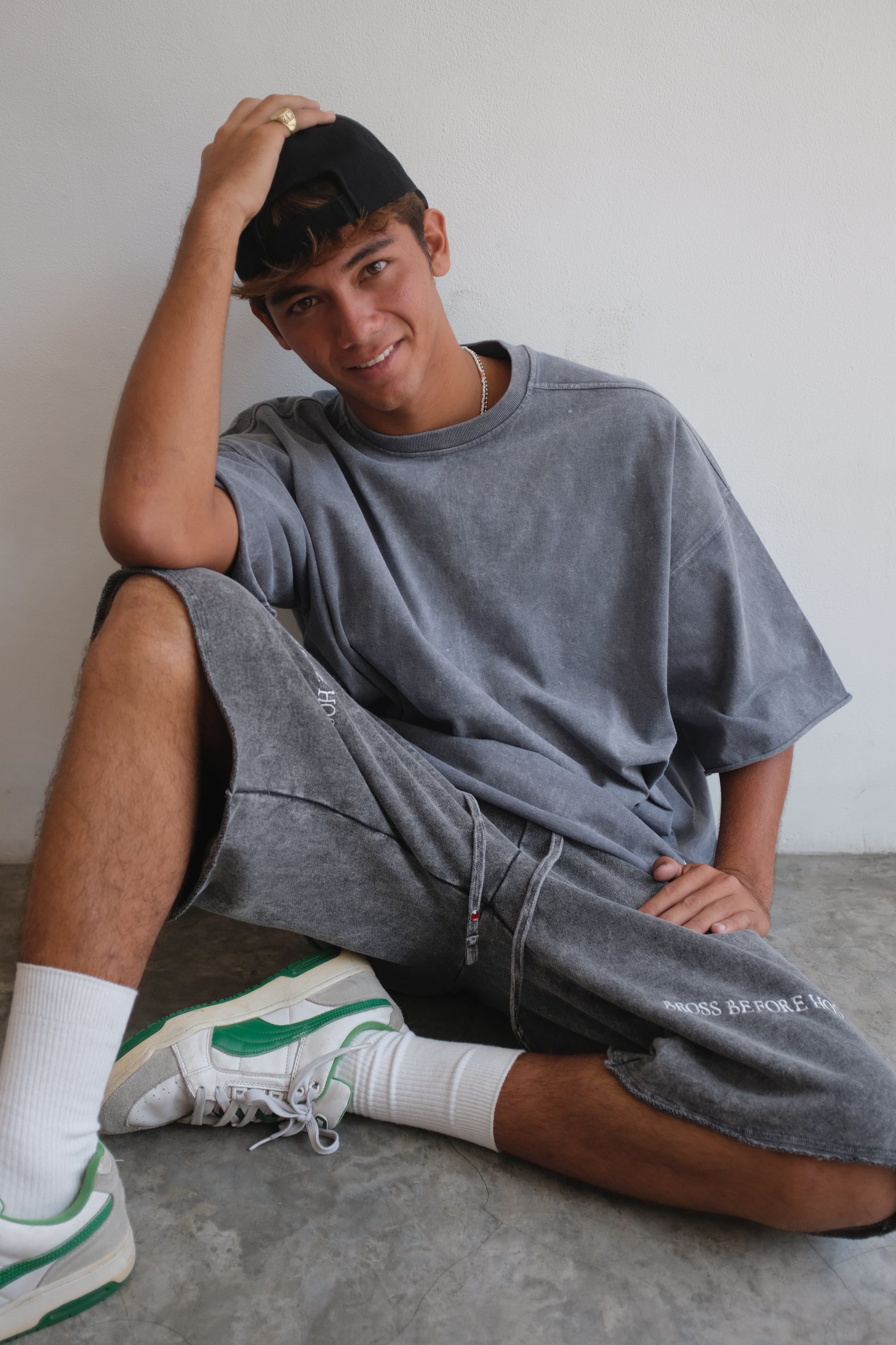 Bross Before Hos Boutique stonewashed grey T-shirt with a relaxed fit and casual style, displayed on a plain background.