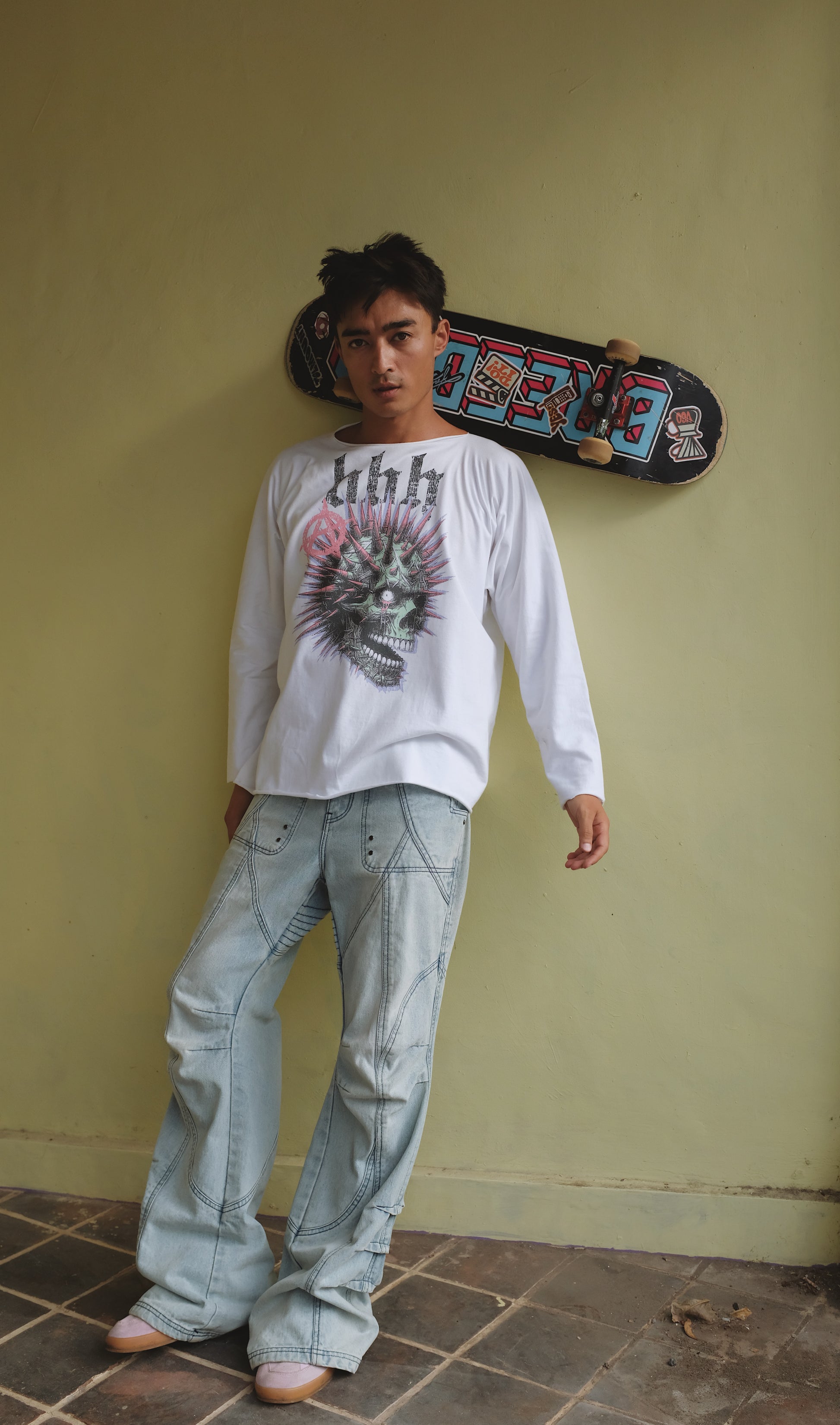 White longsleeve T-shirt with skull print from Bross Before Hos Boutique, featuring a stylish skull graphic design.