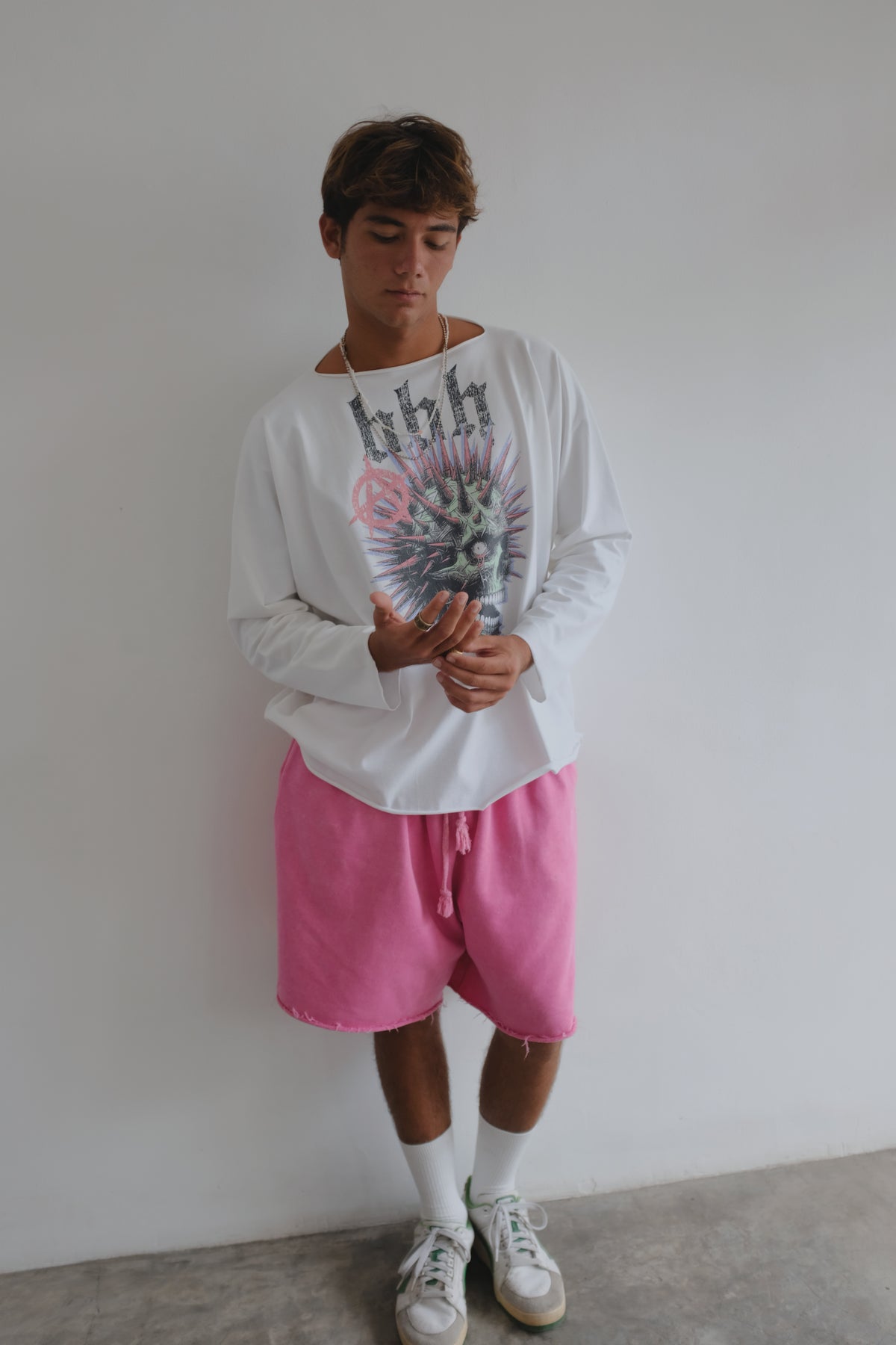 White long sleeve T-shirt with skull print from Bross Before Hos Boutique, featuring a casual fit and graphic skull design.