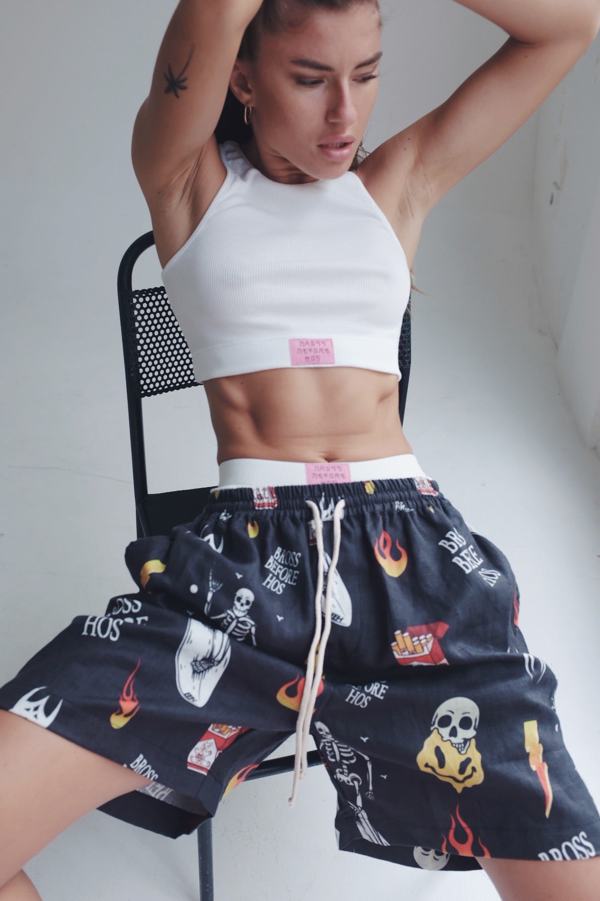 Black linen printed shorts with straight fit from Bross Before Hos Boutique, featuring a casual, breathable design.