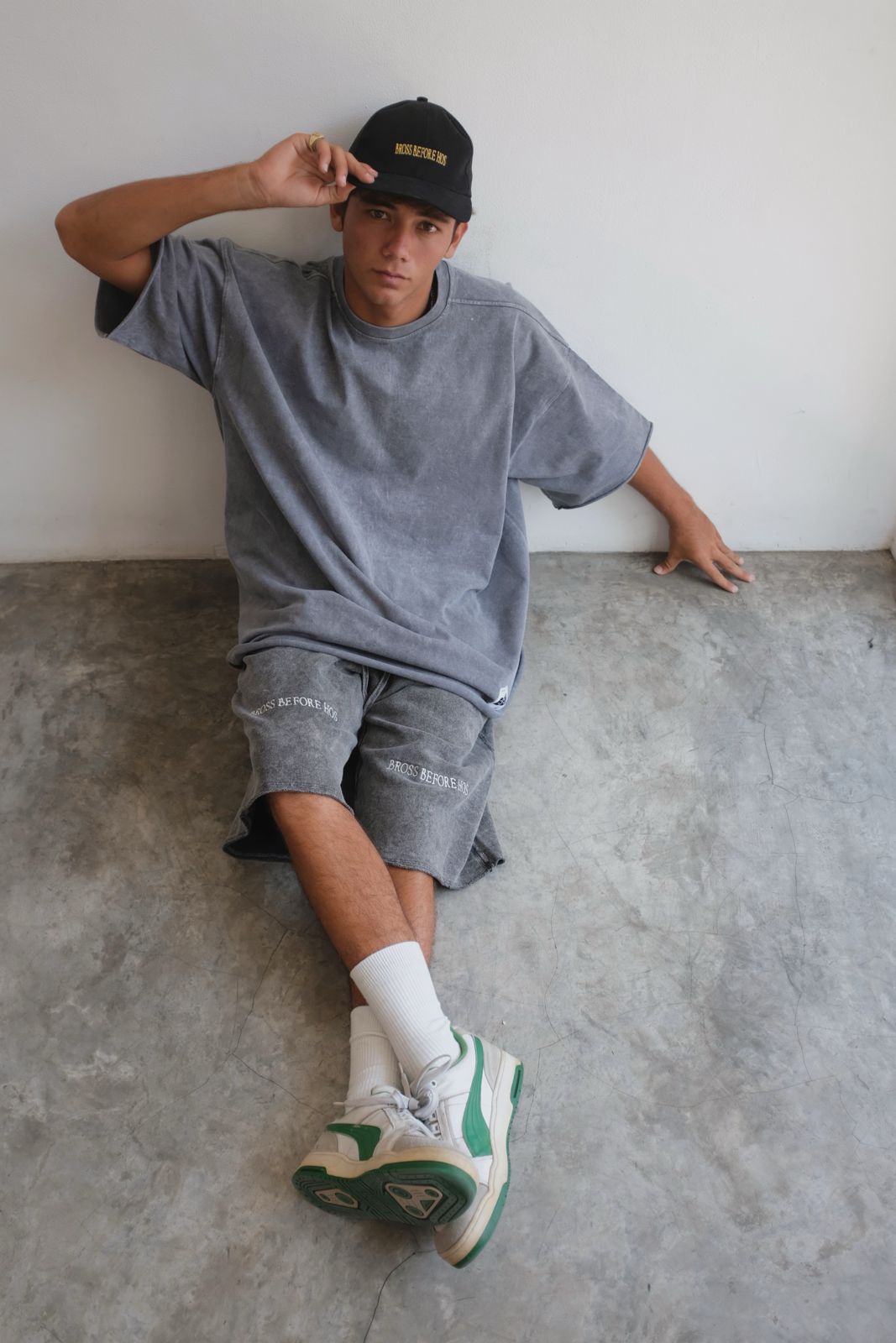 Black stonewashed T-shirt from Bross Before Hos Boutique, showing a relaxed fit with a vintage-inspired design.