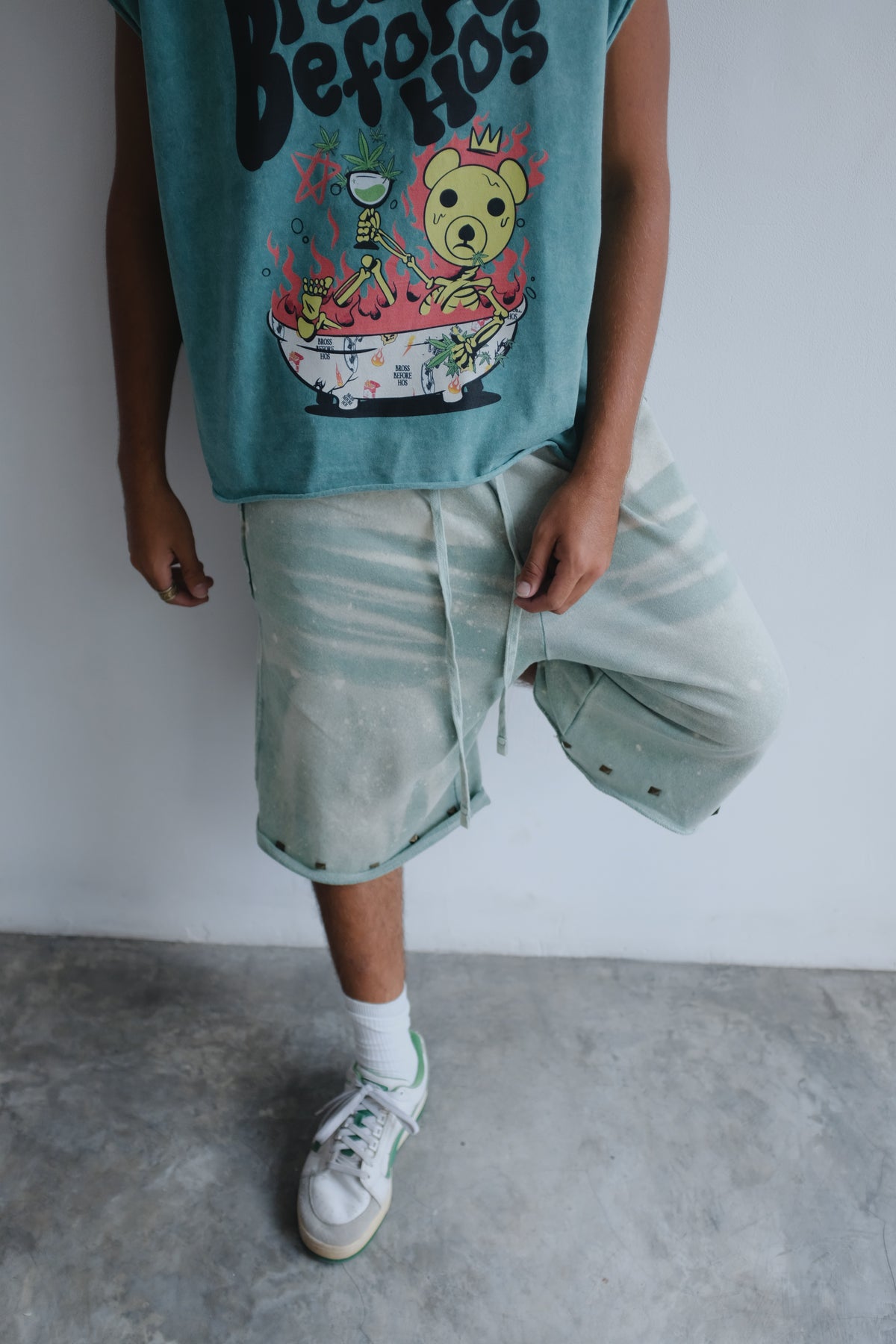 Green French Terry shorts by Bross Before Hoss Boutique, casual long-length shorts with comfortable fabric and relaxed fit.