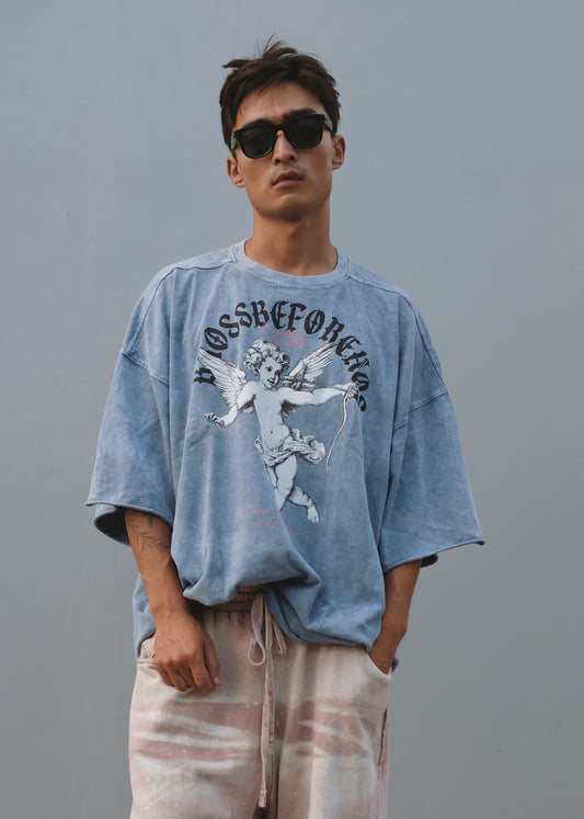 BROSS BEFORE HOS BOUTIQUE printed T-shirt featuring an angel graphic on the front, casual and stylish for everyday wear.