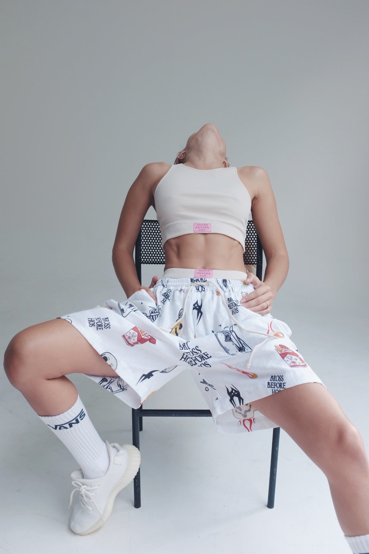 White straight fit linen printed shorts from Bross Before HOS Boutique, showing a casual, lightweight design with a floral pattern.