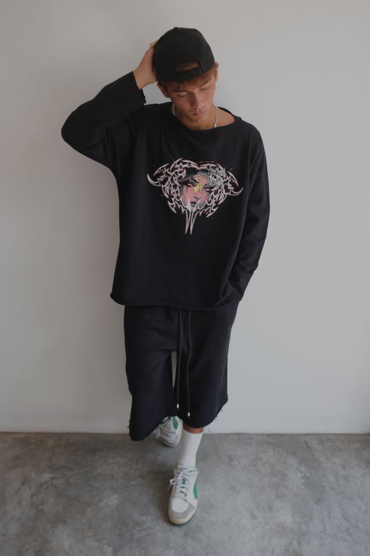 Black French Terry long shorts by Bross Before Hos Boutique, showing the comfortable fabric and relaxed fit.