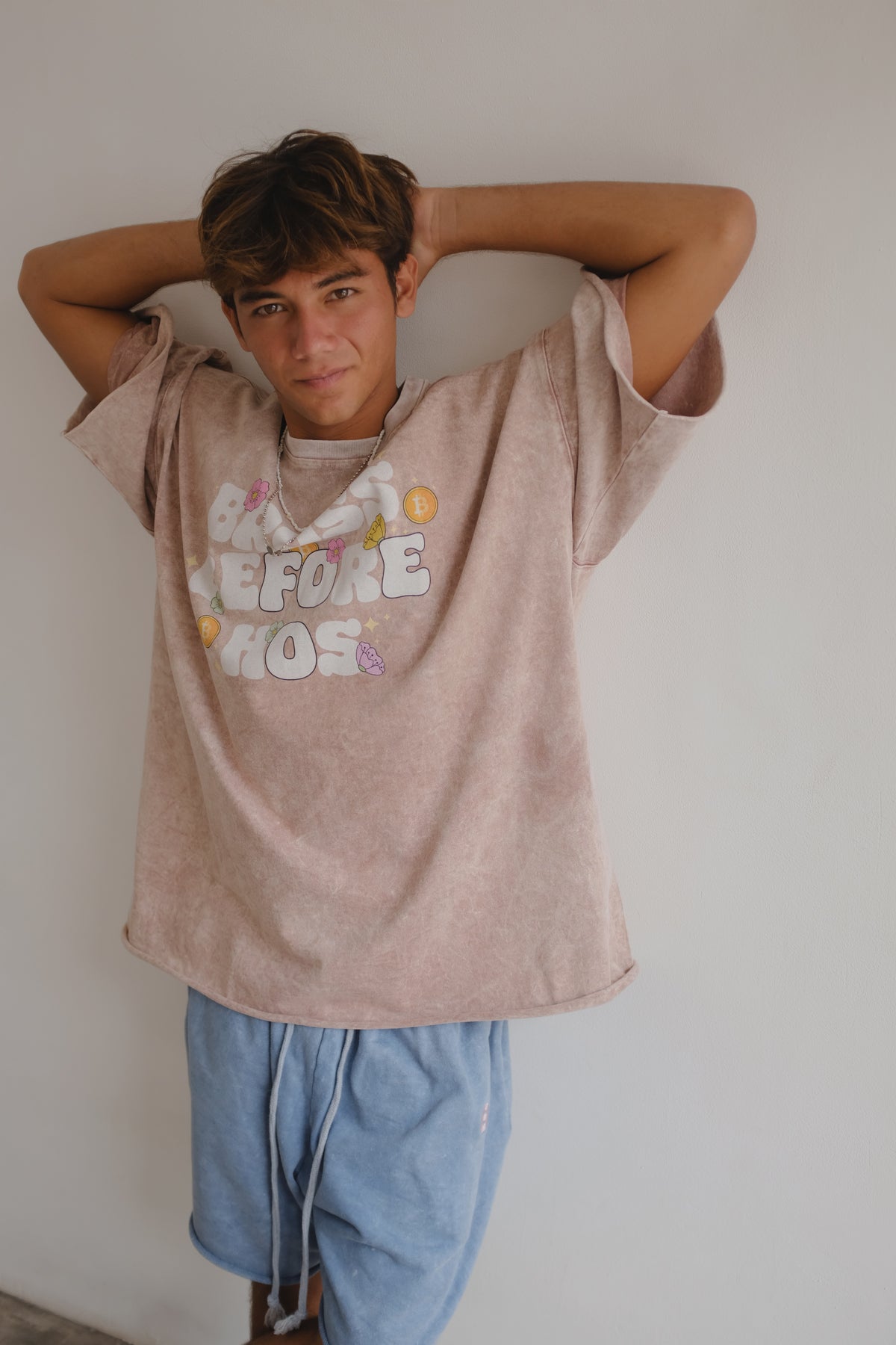 Bross Before Hos Boutique T-shirt with colorful floral print, casual short-sleeve design, soft fabric, and round neckline.