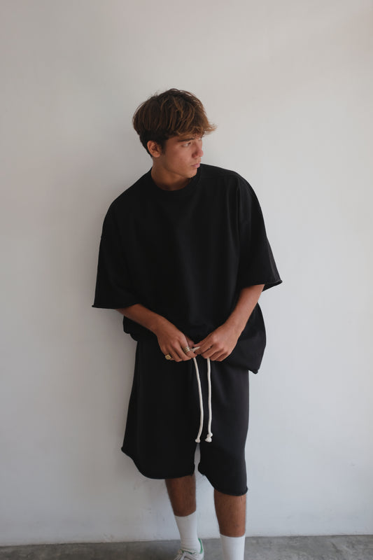 Black BROSS BEFORE HOS Boutique T-shirt displayed flat, showing the front with a simple round neckline and short sleeves.