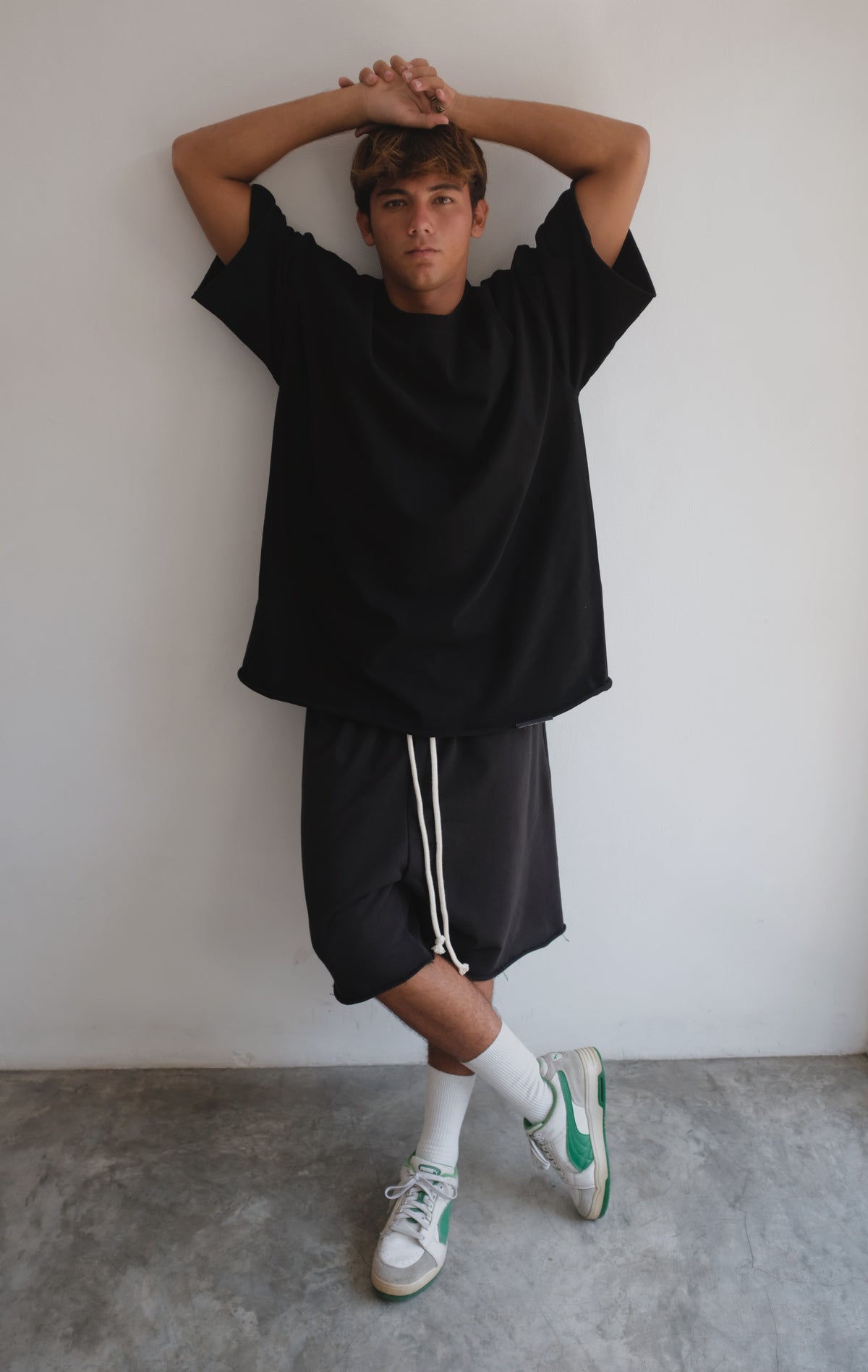 Black T-shirt from Bross Before Hos Boutique, featuring a classic crew neck and soft cotton fabric.
