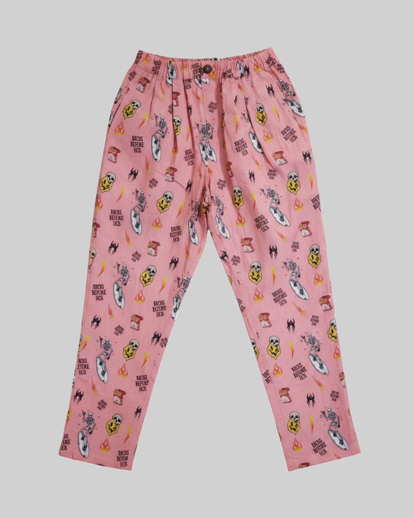 Relaxed fit pink linen printed pants from Bross Before Hos Boutique, showing lightweight, comfortable fabric and stylish design.