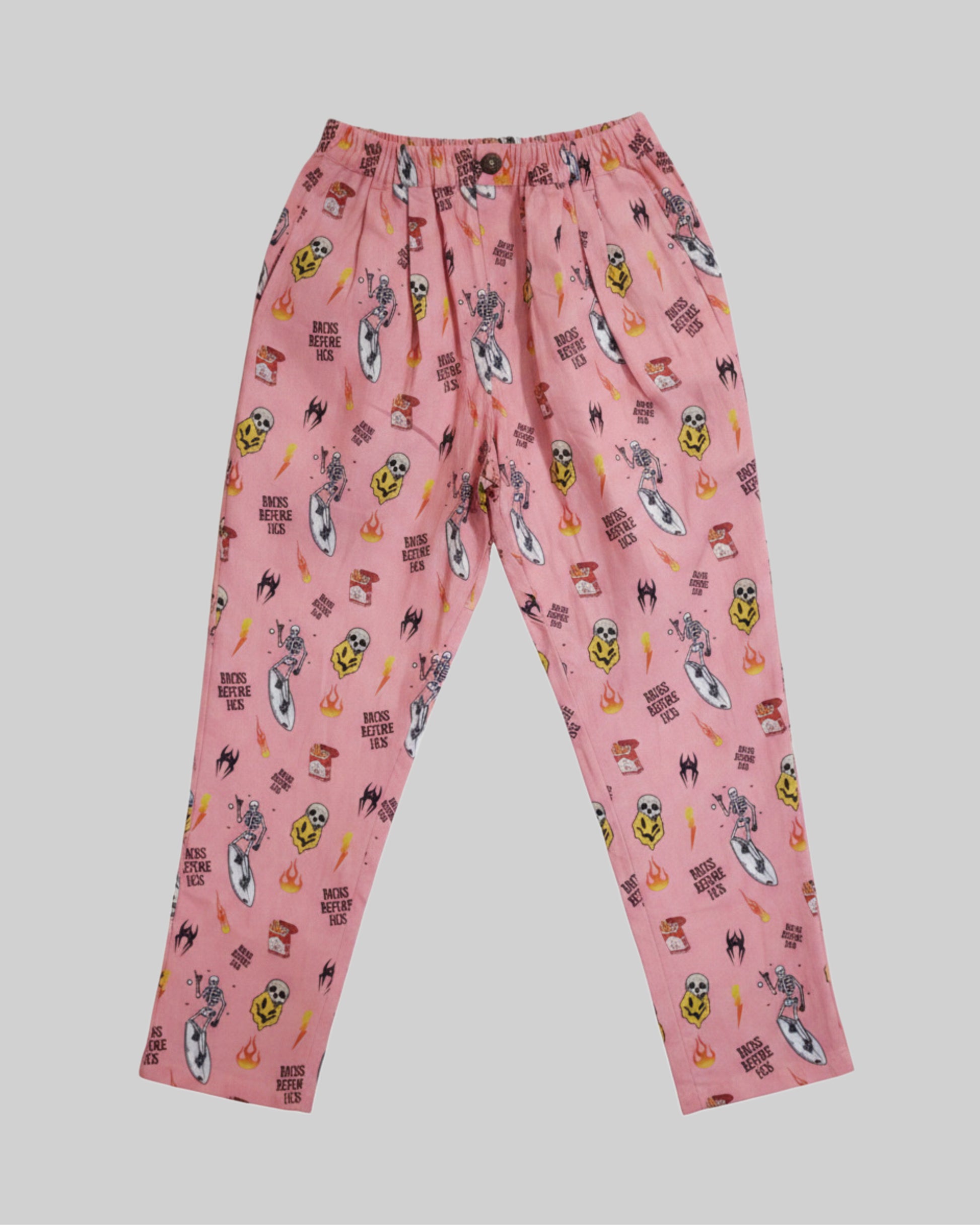 Relaxed fit pink linen printed pants from Bross Before Hos Boutique, showing lightweight, comfortable fabric and stylish design.