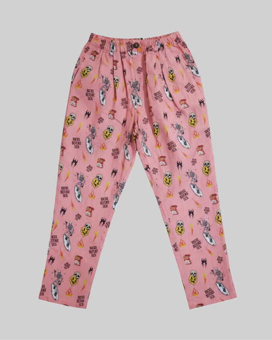 Relaxed fit pink linen printed pants from Bross Before Hos Boutique, showing lightweight, comfortable fabric and stylish design.