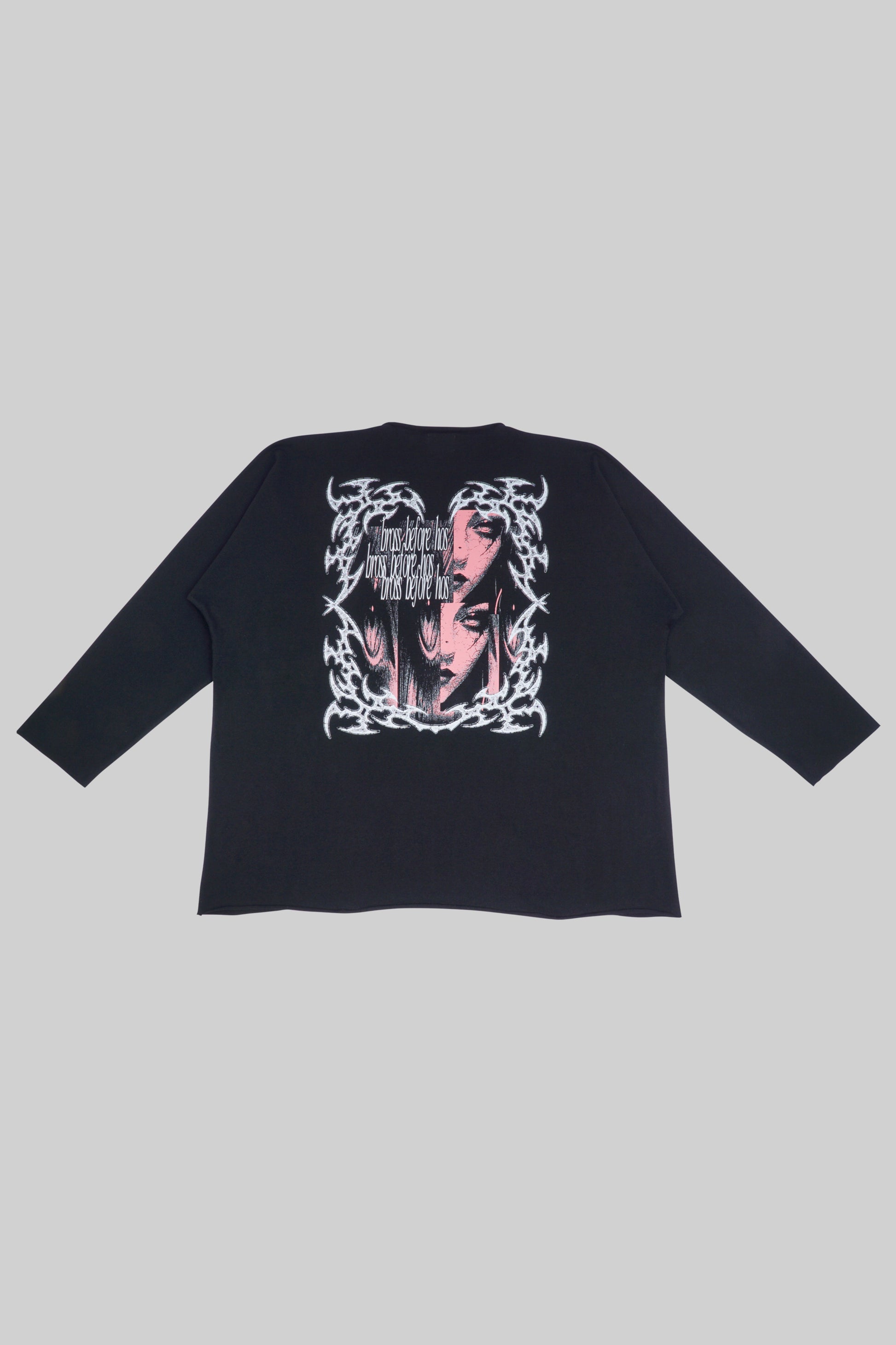 Black longsleeve T-shirt with a face print by Bross Before Hos Boutique, featuring graphic artwork on the front.