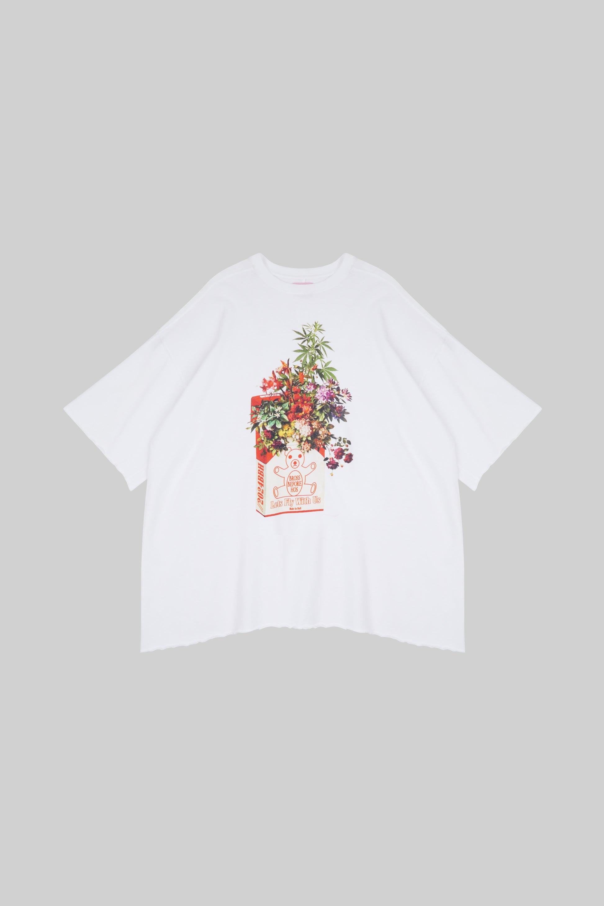 Bross Before Hos Boutique floral graphic print T-shirt showing colorful flower designs on soft fabric.