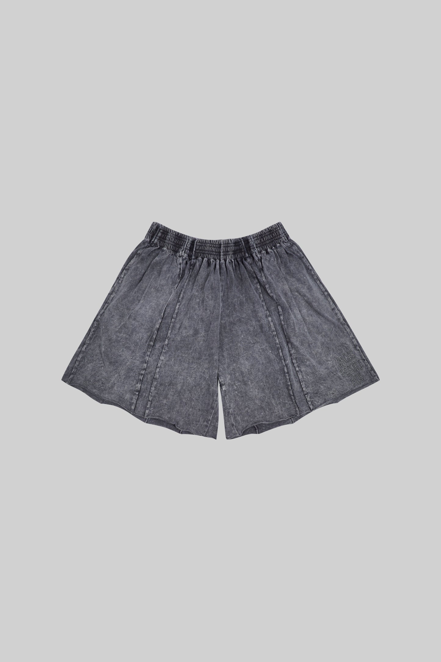 BROSS BEFORE HOS BOUTIQUE shorts panel, casual shorts with colorful patchwork design, front view on a white background.