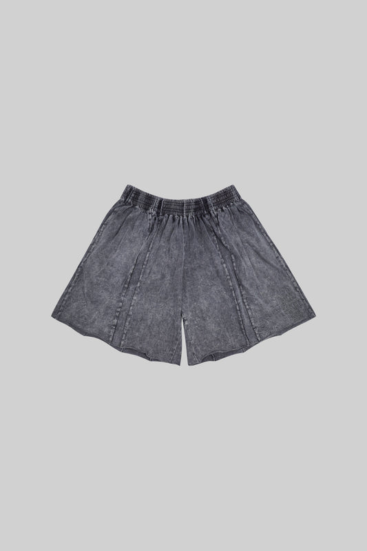 BROSS BEFORE HOS BOUTIQUE shorts panel, casual shorts with colorful patchwork design, front view on a white background.