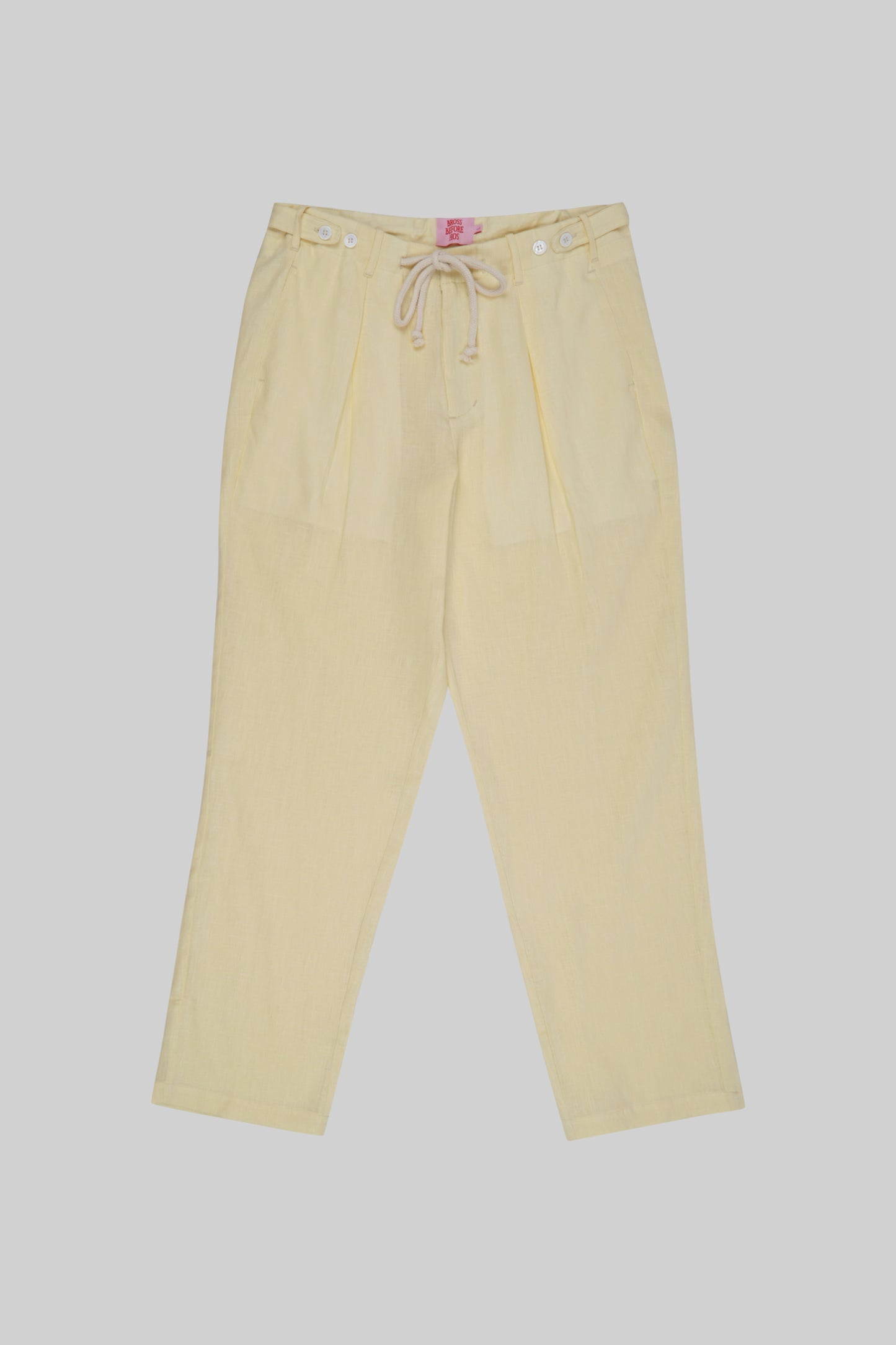 Light beige linen pants from Bross Before H Os Boutique, showcasing relaxed fit and breathable fabric for casual wear.