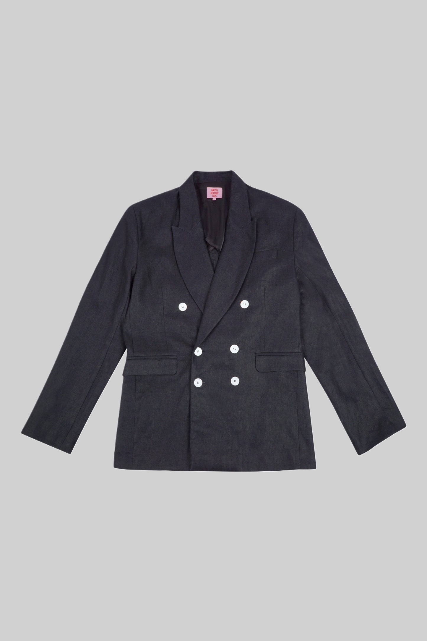 Black linen jacket from Bross Before H Os Boutique, shown on a hanger with a relaxed fit and lightweight fabric.