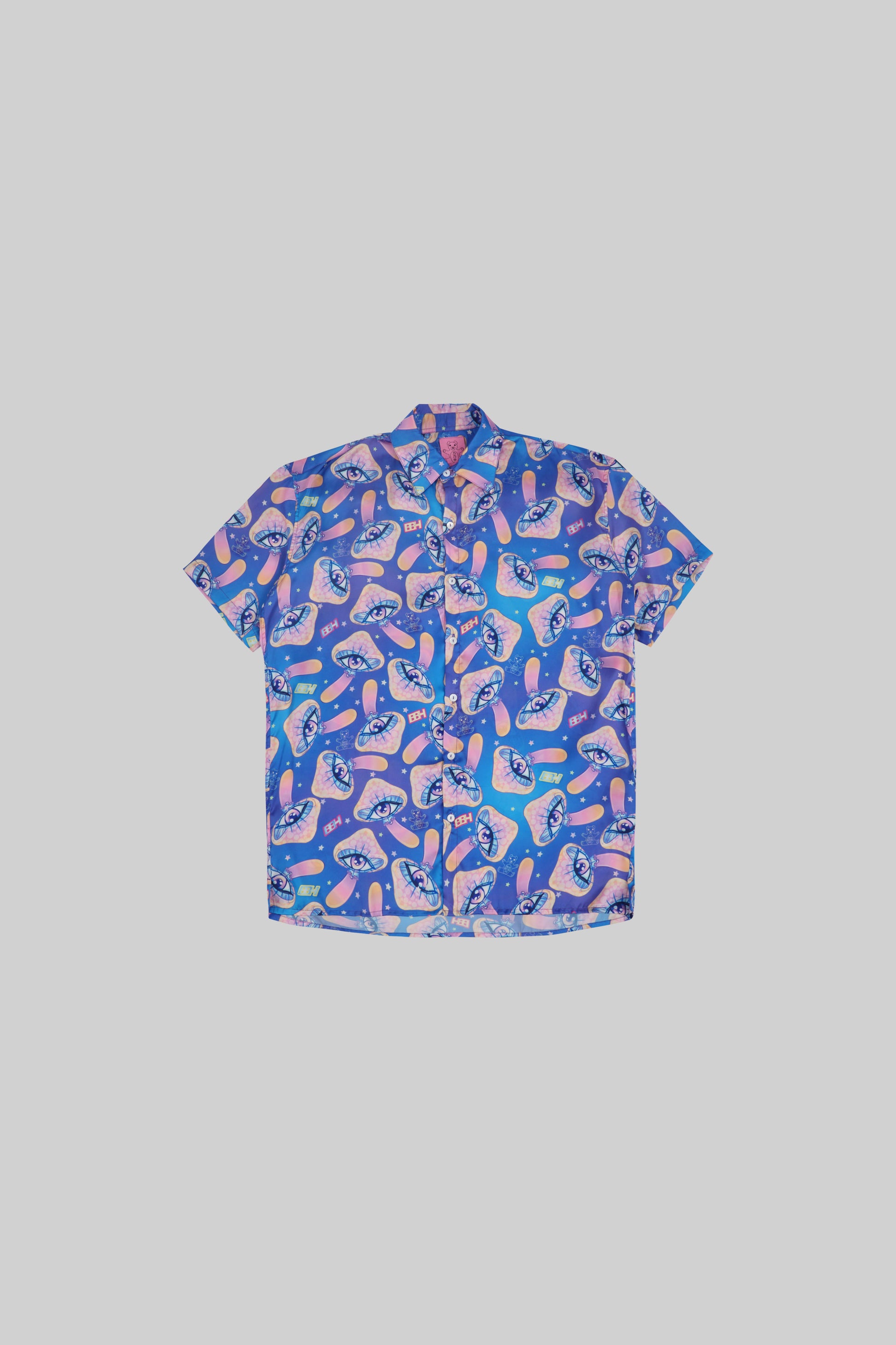 Mushroom-themed shirt from Bross Before Hos Boutique, featuring a stylish design on a casual shirt.