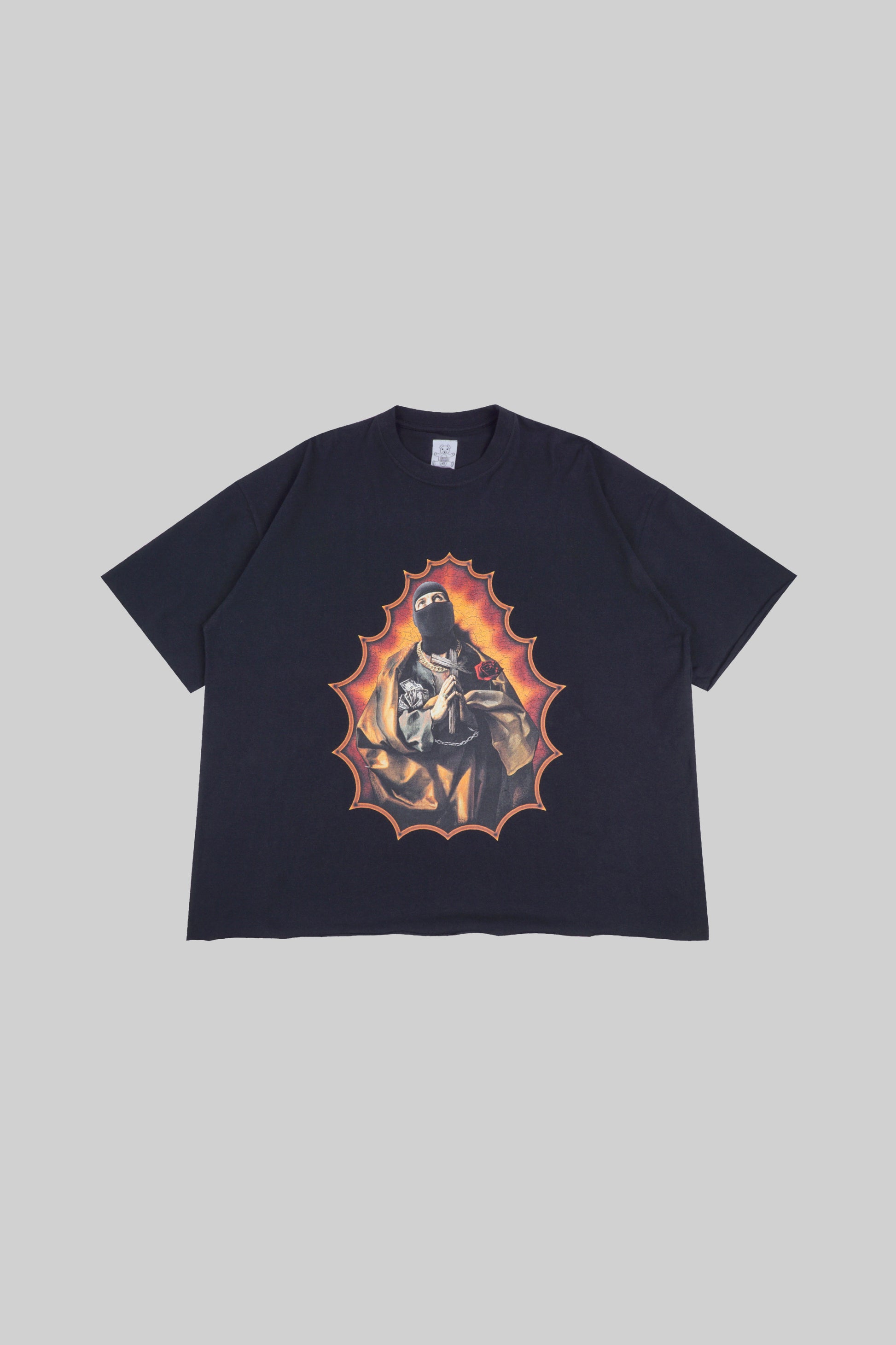 Black T-shirt with white "Terrorist" print from Bross Before Hos Boutique, featuring a casual fit and bold graphic design.