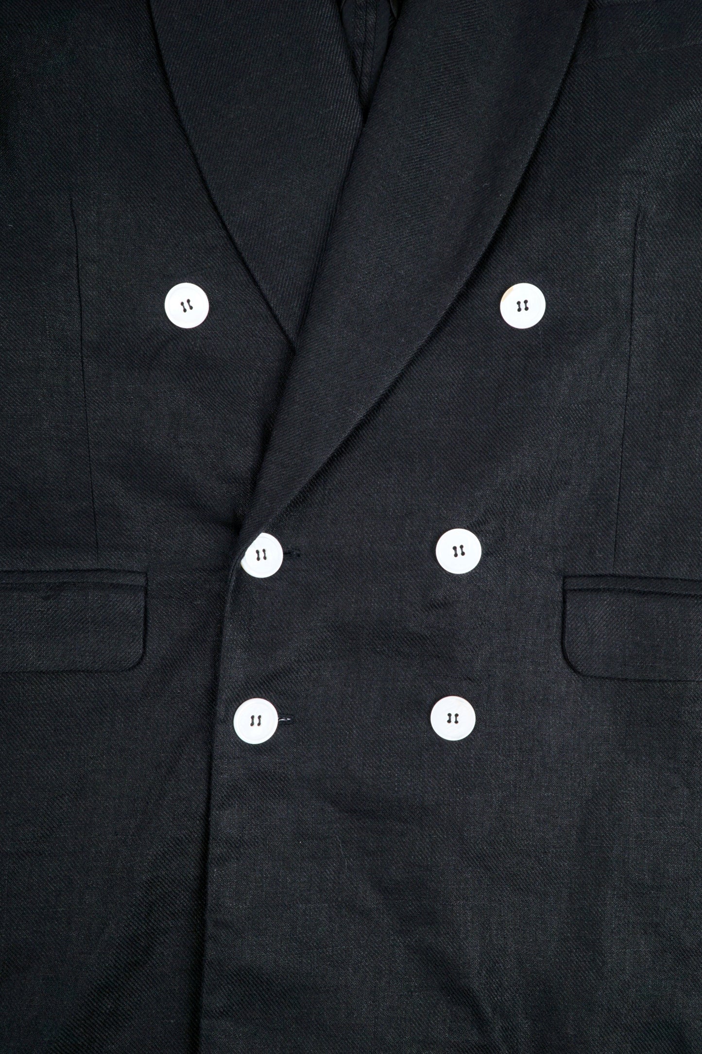 Black linen jacket from Bross Before Hos Boutique, featuring a comfortable fit and stylish design.