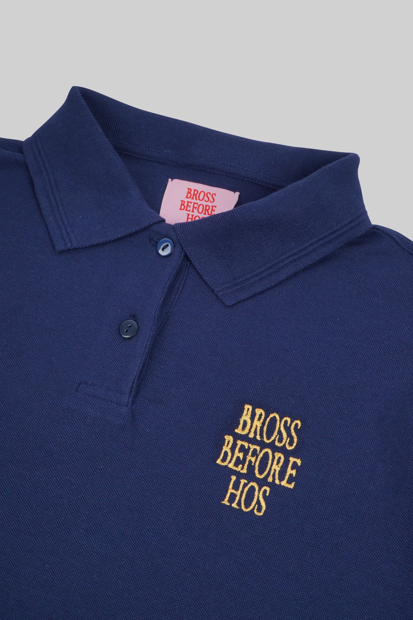 Women's polo T-shirt by Bross Before Hos Boutique, featuring a classic fit and soft fabric in a stylish design.