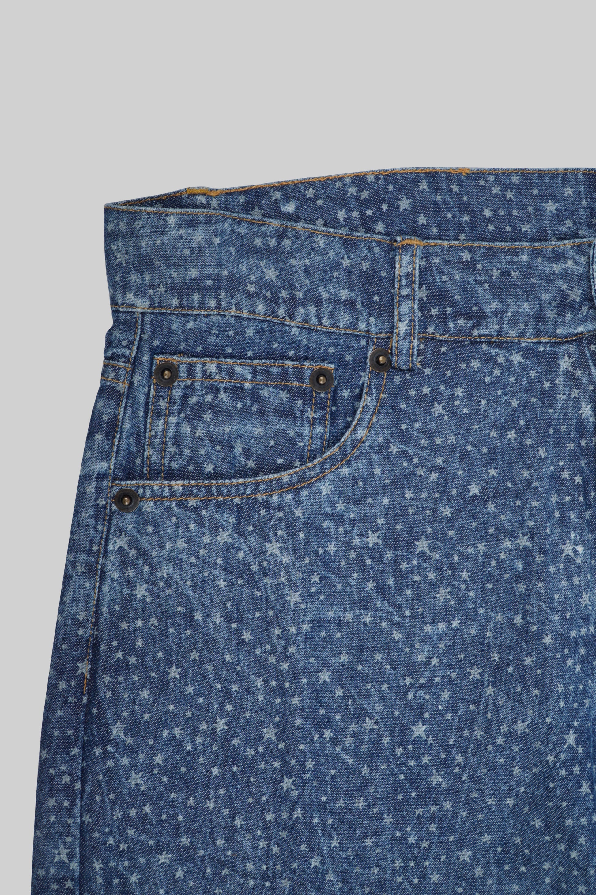 Blue jeans pants with star patterns from Bross Before Hos Boutique, featuring a casual fit and stylish design.