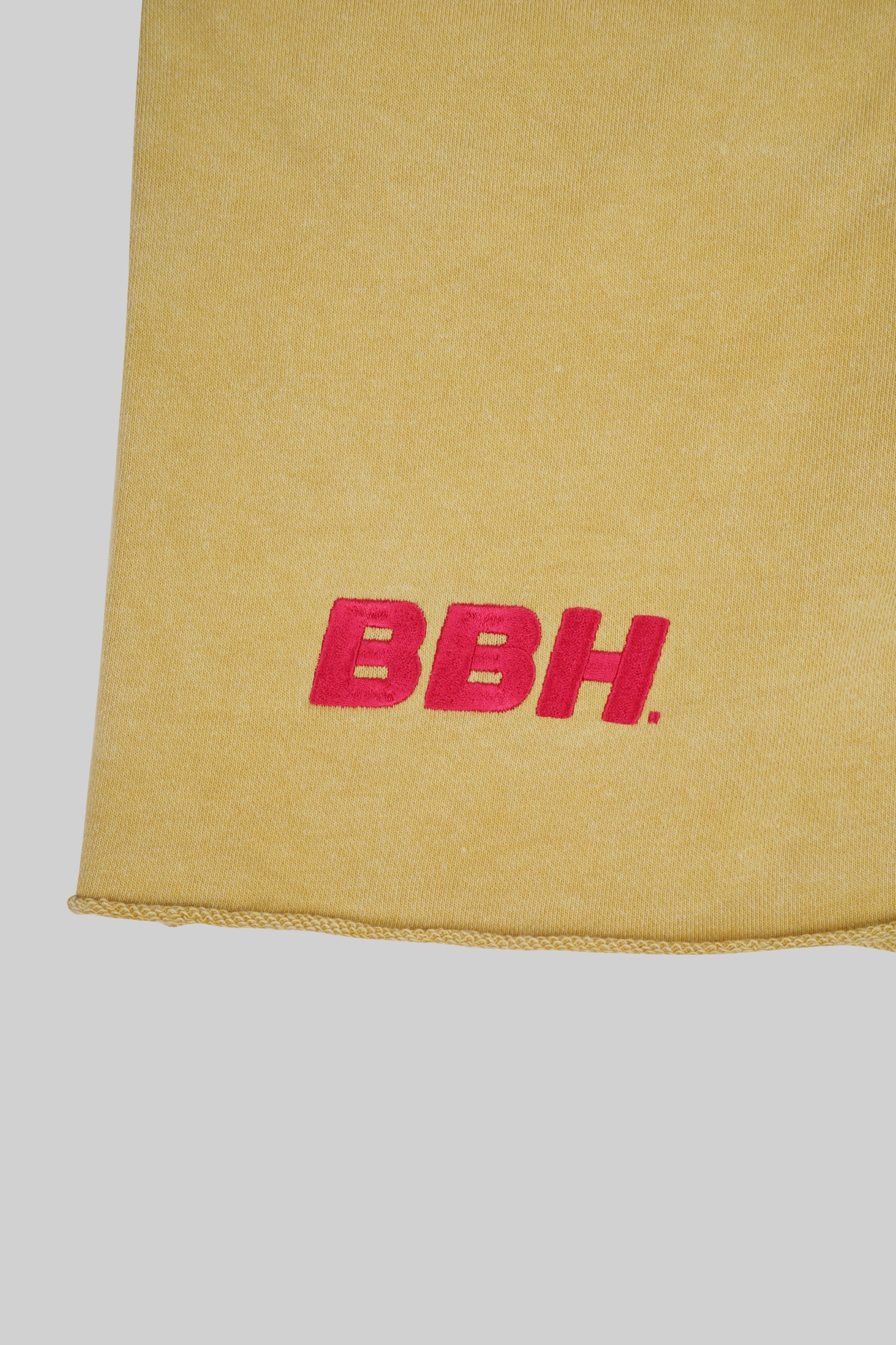 Yellow French Terry shorts from Bross Before H Os Boutique, showing the soft fabric and relaxed fit on a model.