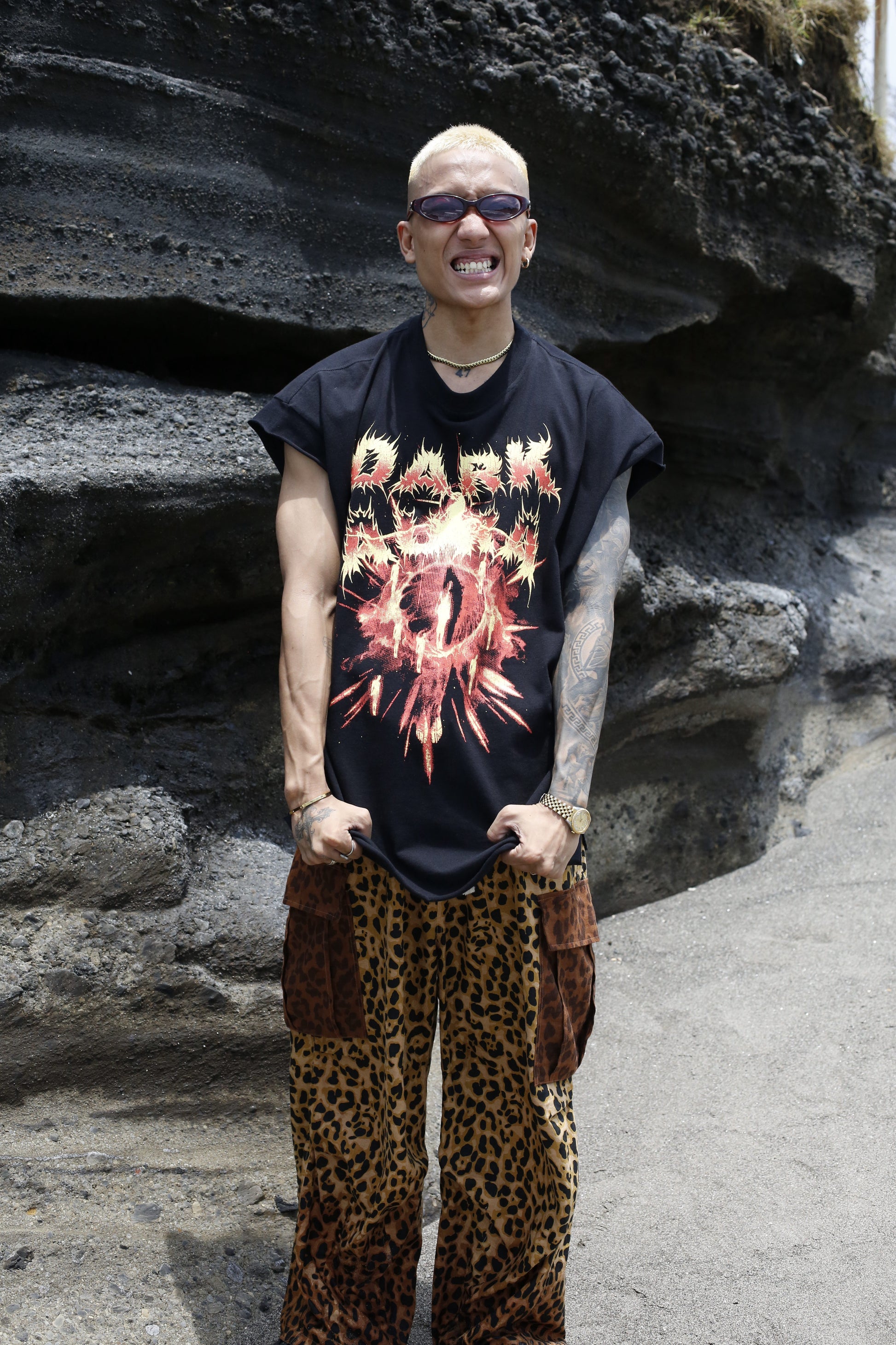 Black muscle top with white print from Bross Before HOS Boutique, featuring a sleeveless design and casual fit.