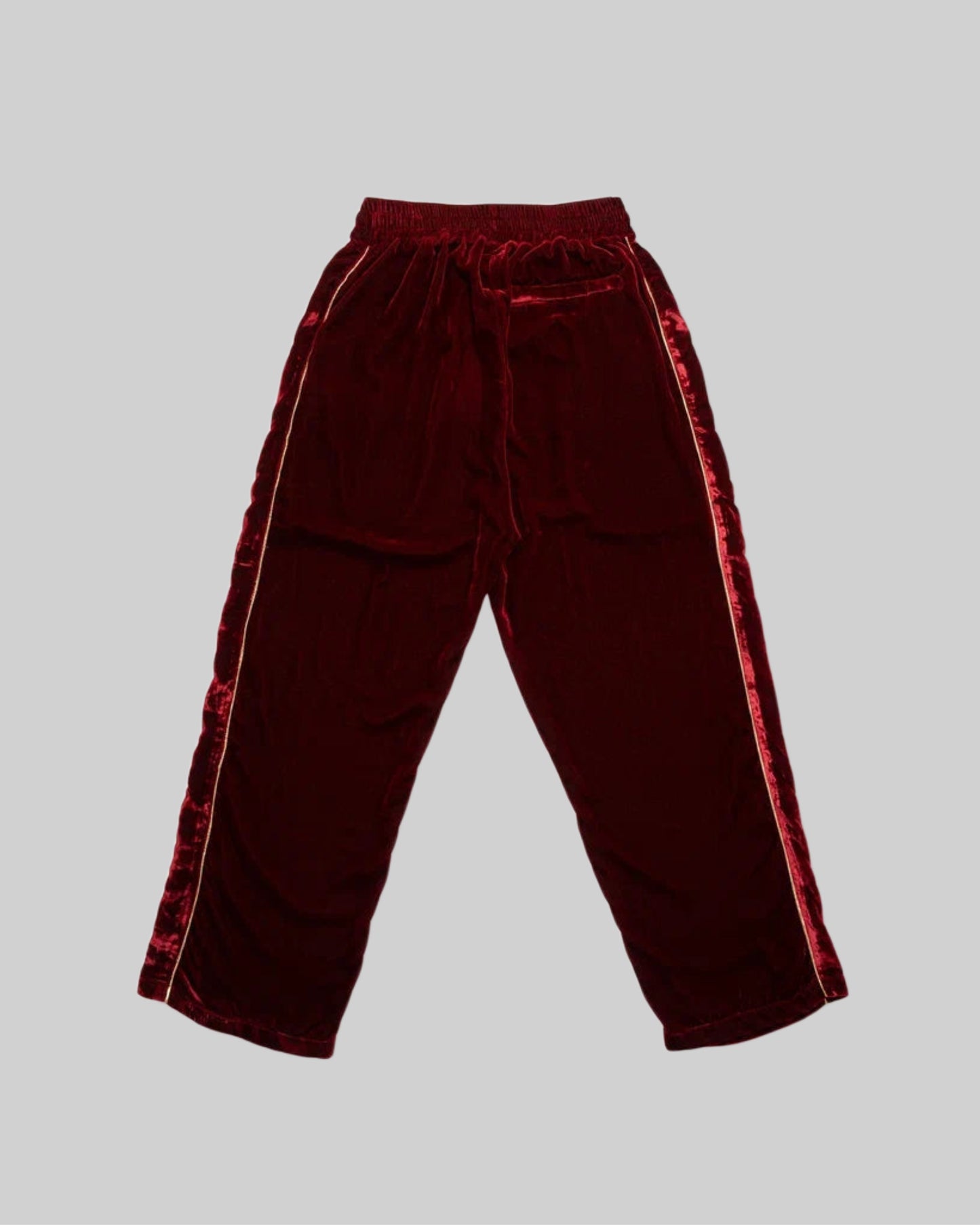 Red silk velvet track pants from Bross Before HOS Boutique, featuring a relaxed fit and stylish design.